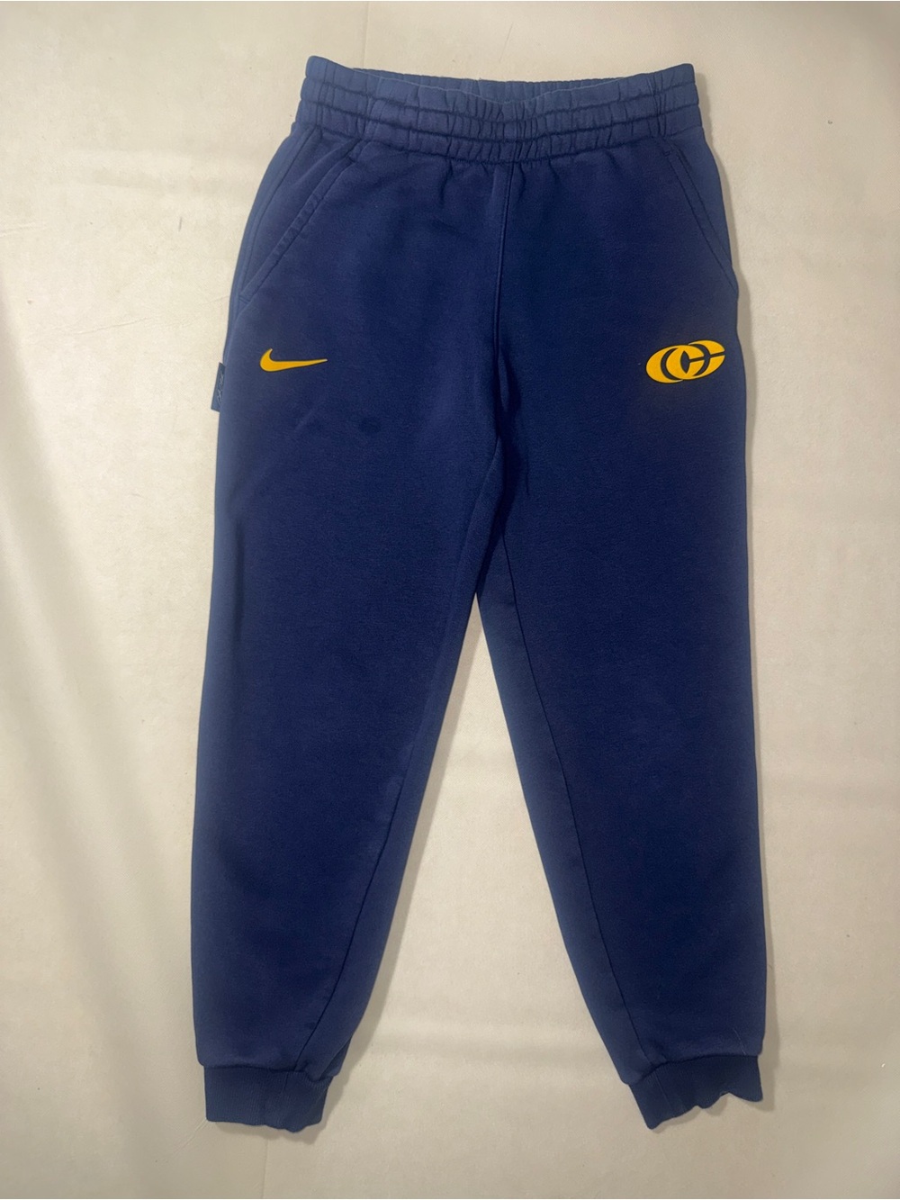 Nike Kids Navy Sweatpants with Yellow Logos